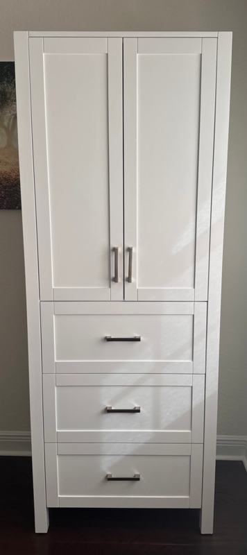 Double Door White Linen Cabinet with Three Drawers and Tapered Legs