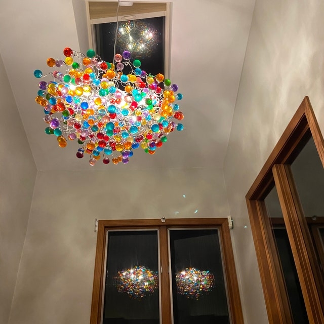 Eclectic Foyer Centerpiece with Clustered Organic Orbs