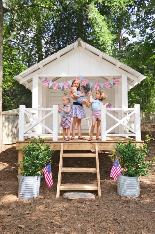 Elevated White Playhouse with X-Brace Railing & Gabled Roof