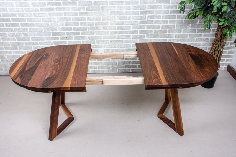 Extendable Walnut Dining Table featuring V-Shaped Geometric Legs