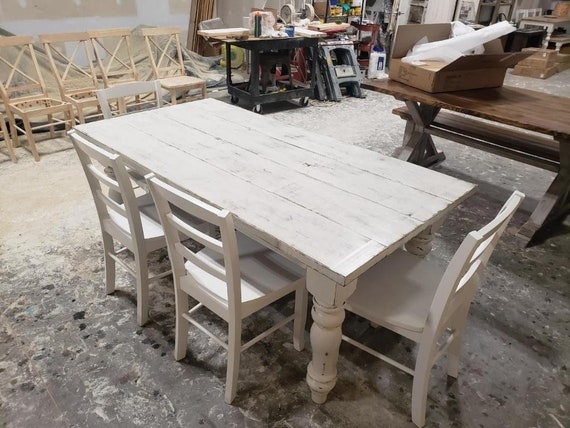 Farmhouse Dining Set: Rustic Ladder Back Chairs, Turned Legs, Plank Top.