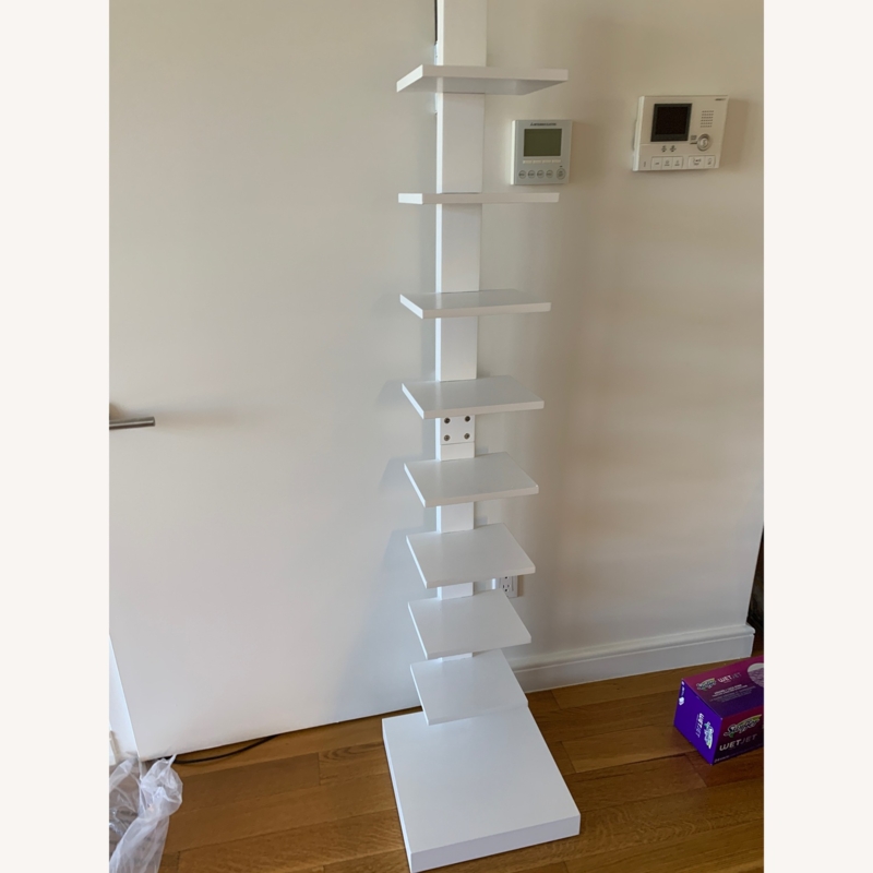 Floor Standing Spine Bookshelf featuring a Weighted Square Base