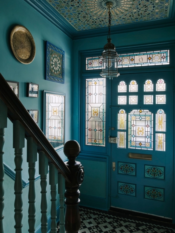 Front Door Teal Monochrome Walls Geometric Ceiling Leaded Glass