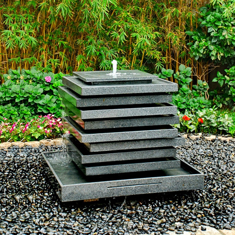 Garden Fountain: Stacked Slabs Design for Zen Outdoor Feature
