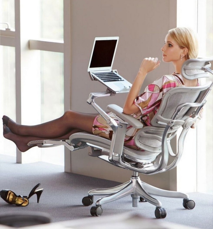 High-Tech Ergonomic Chair with Integrated Laptop Arm and Footrest