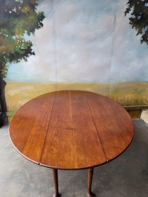 Honey Oak Gateleg Table with Traditional Turned Legs and Drop Leaves