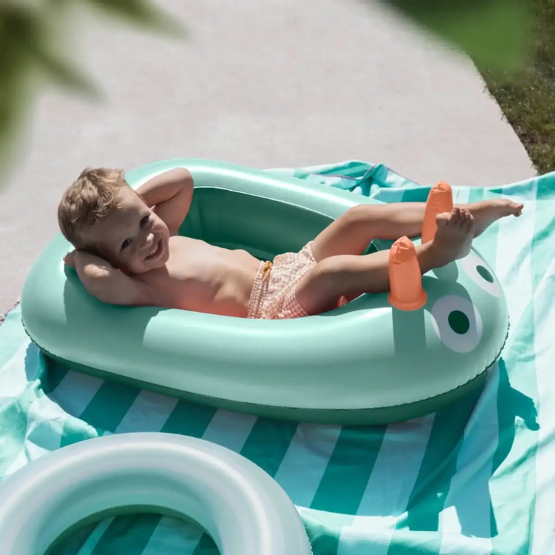 Inflatable Boat: Mint Green with Orange Accents, Frog Face Design.