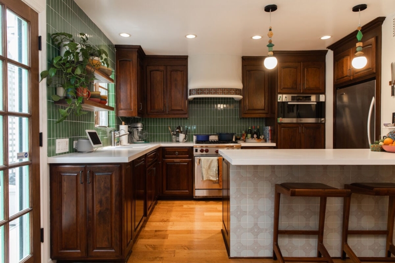 Kitchen Backsplash featuring Vertical Green Tile and Geometric Island