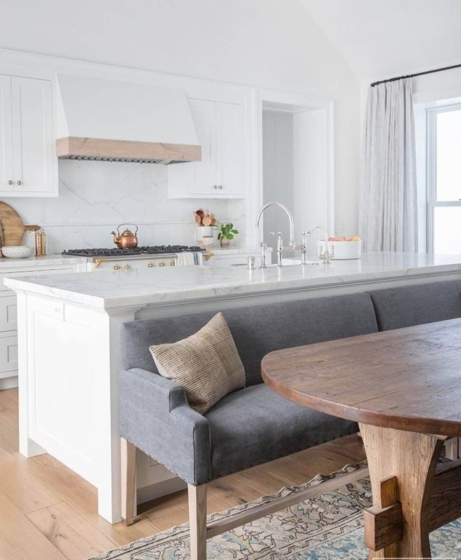 Kitchen Island Banquette with Wood Trim Hood and Sofa Arms.