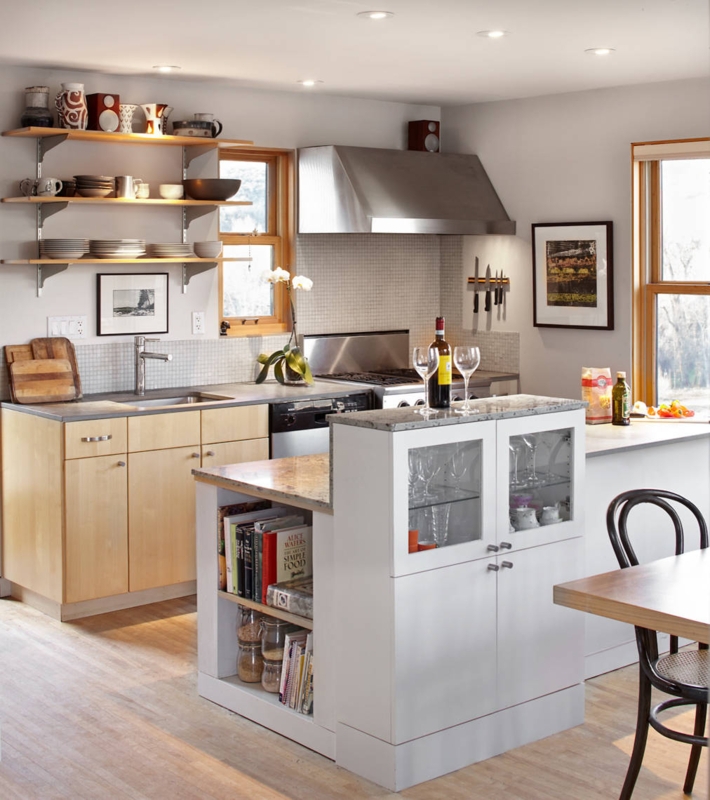 Kitchen Island with Two-Tier Design and Integrated Bookshelf.