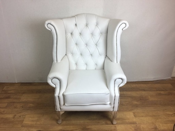 Light Natural Wood Leg Wingback Chair with Silver Trim