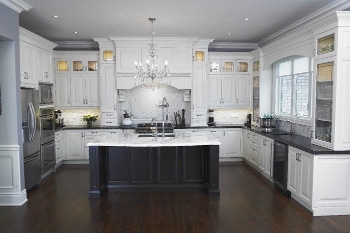 Luxury Kitchen Island Contrast With Ornate Crystal Chandelier