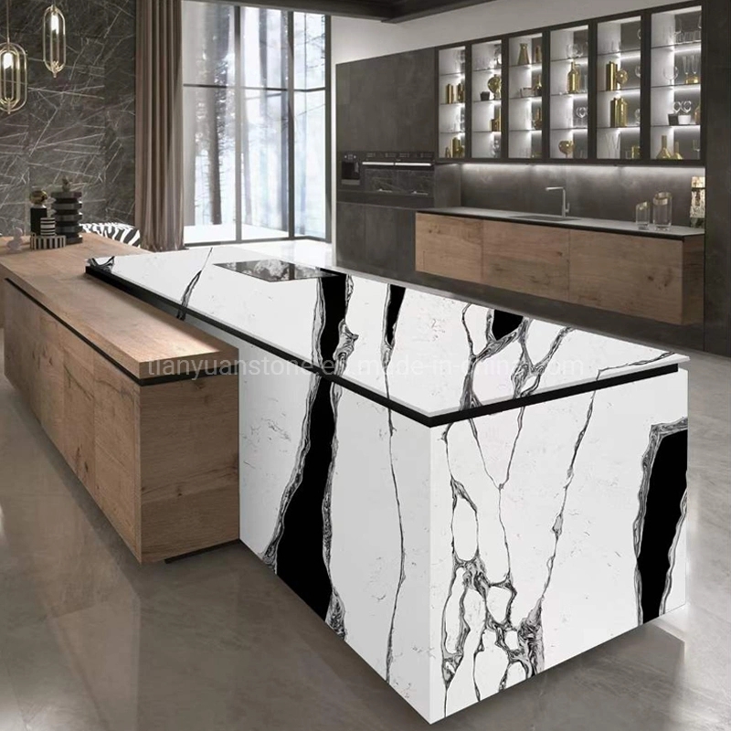 Luxury Kitchen Island Featuring Stepped Countertop And Bold Veining