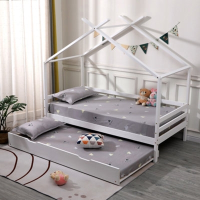 Matte White House Bed With Trundle, Open Canopy, and Safety Guardrails.