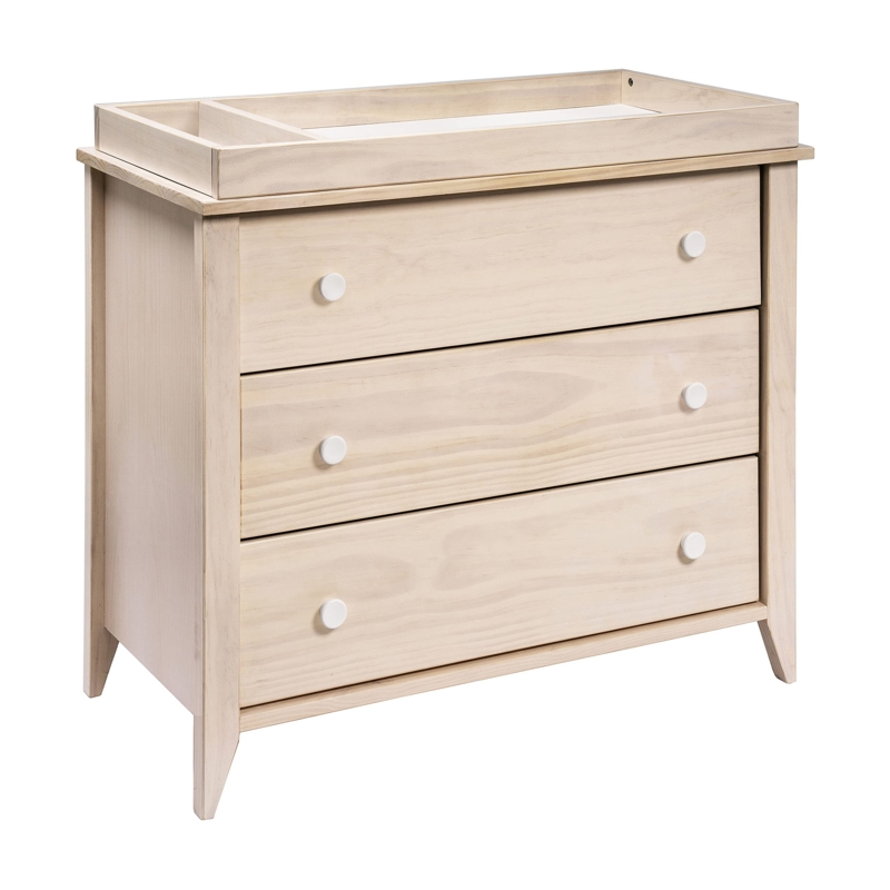 Mid-century modern baby dresser with tapered legs and blonde wood