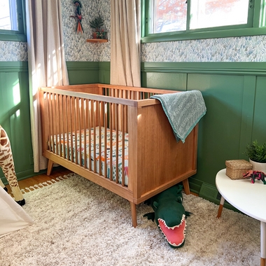 Mid-Century Modern Nursery Crib with Tapered Legs and Hazelnut Finish