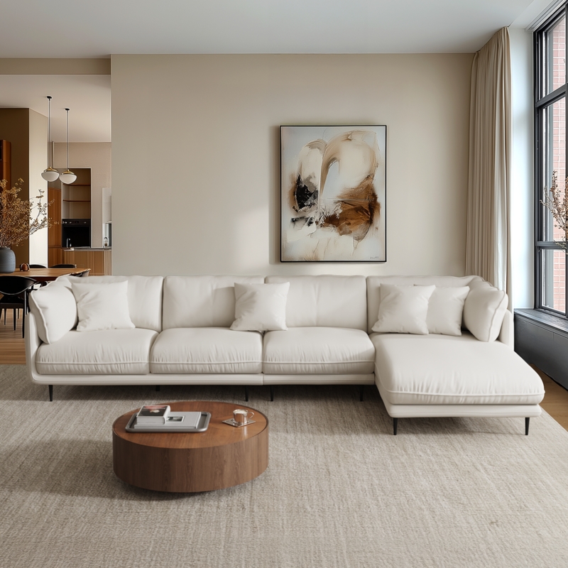 Minimalist Sectional Sofa with Loose Back Cushions and Thin Tapered Legs