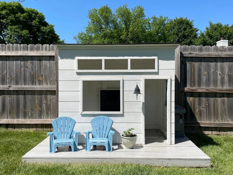 Minimalist White Playhouse with Flat Roof & Transom Windows