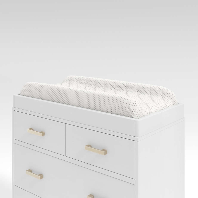 Modern baby changing station with matte white finish and gold hardware