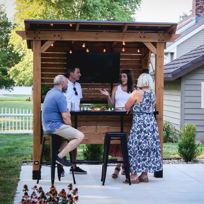 Modern Backyard Bar Pavilion with Integrated Lighting and Sloped Roof