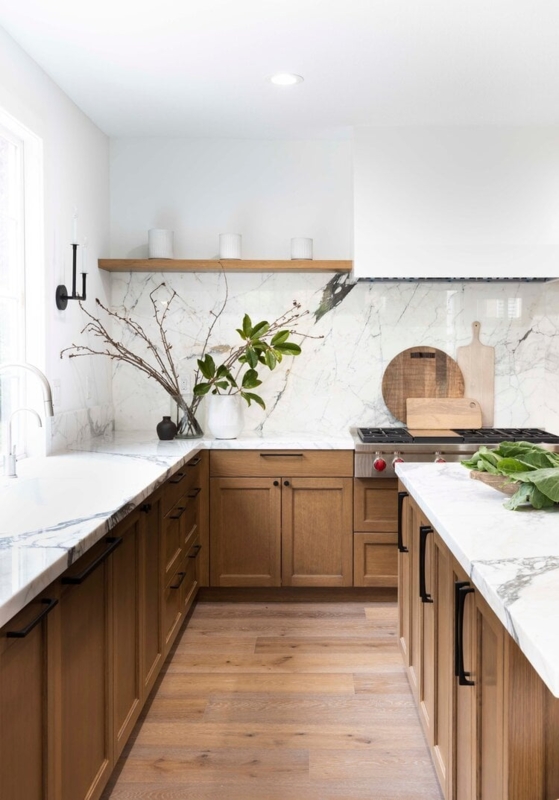 Modern Organic Cabinetry with Heavy Veined Marble Slab Backsplash