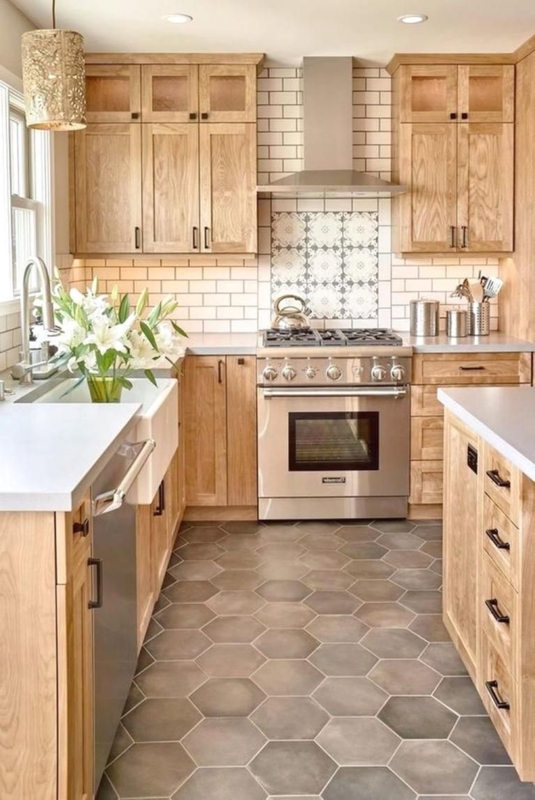 Oak Kitchen Cabinets with Hexagon Floor Tiles and Patterned Backsplash