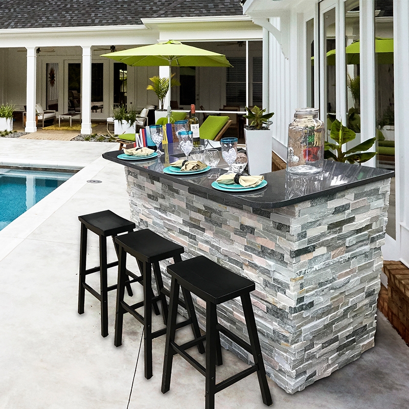 Outdoor Bar with Stacked Stone Base and Polished Dark Countertop