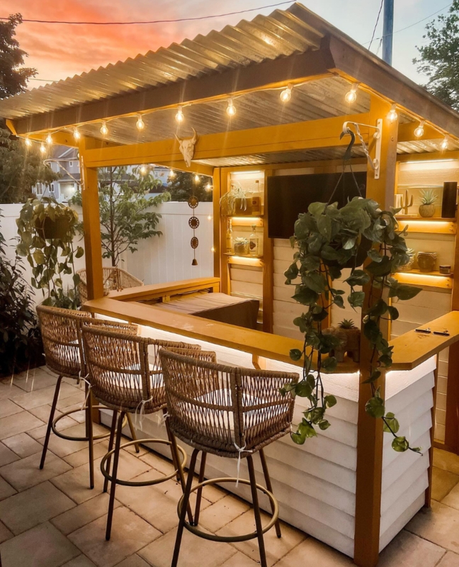 Outdoor Bar with Woven Stools and White Clapboard Base