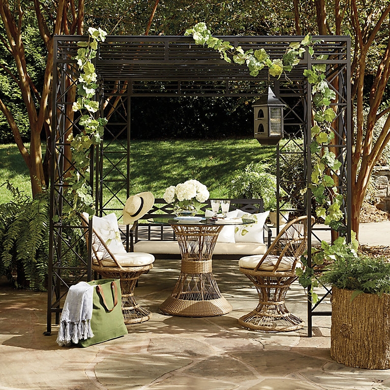 Outdoor Dining Chair: Woven Rattan with Unique Hourglass Pedestal Base