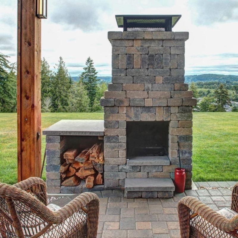Outdoor Fireplace Built from Masonry Pavers with Log Storage Nook