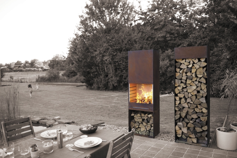 Outdoor Fireplace Tall Vertical Silhouette Weathered Metal Rusted Log Storage