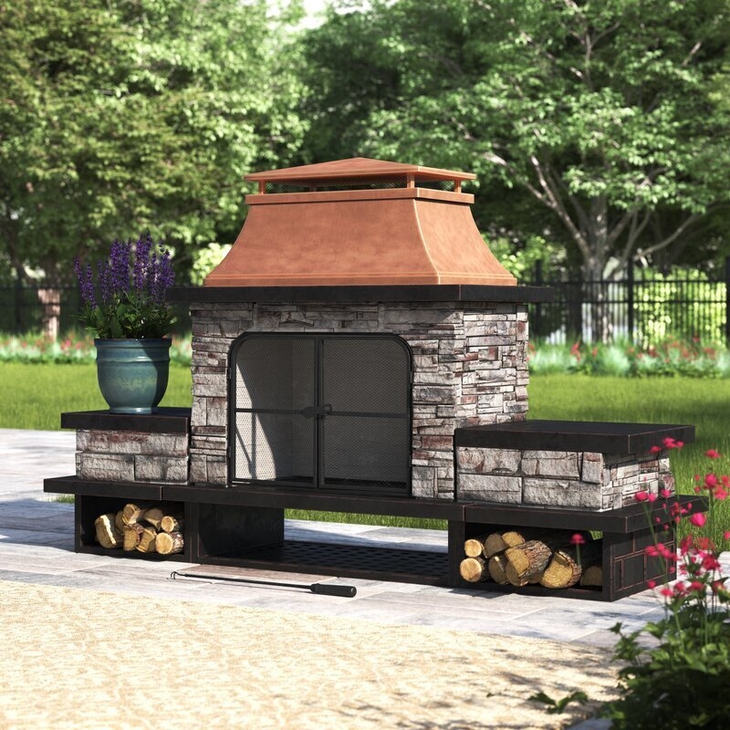 Outdoor Fireplace with Copper Hood and Built-in Wood Storage