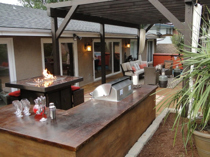 Outdoor Kitchen Bar with Pergola Structure and Fire Table Combo