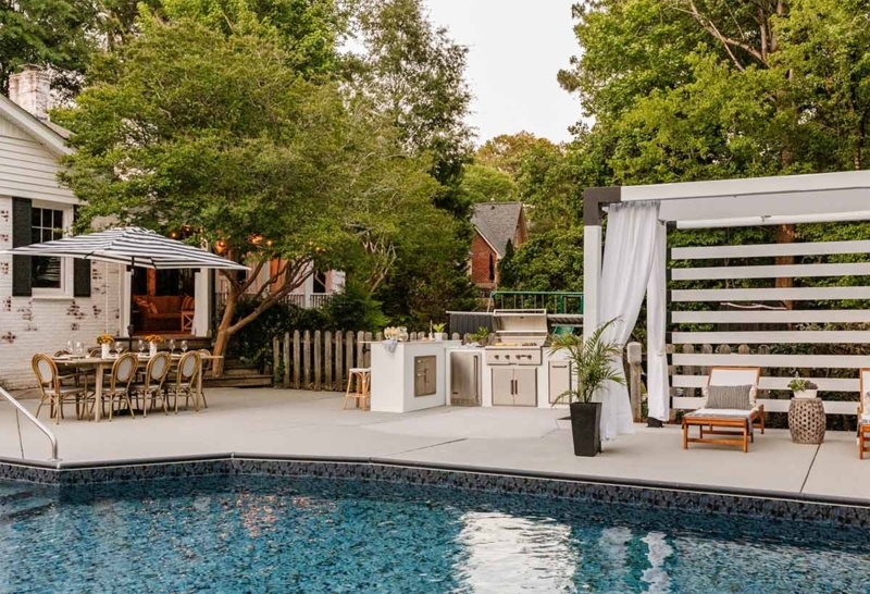Outdoor Kitchen: Crisp White Pergola with Flowing Cabana Curtains.
