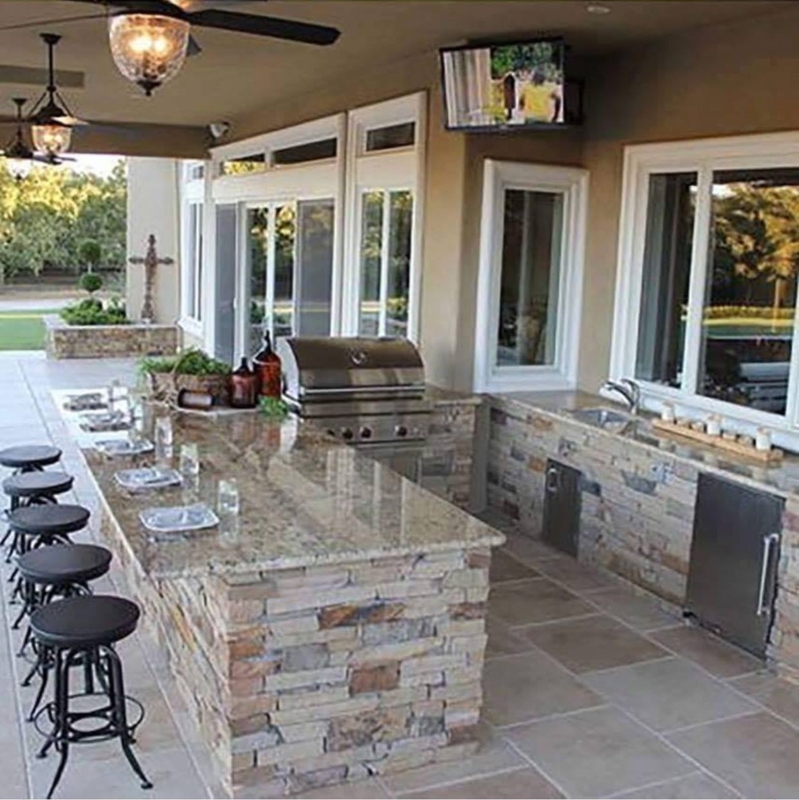 Outdoor Kitchen Island with Stacked Stone Base and Granite Top