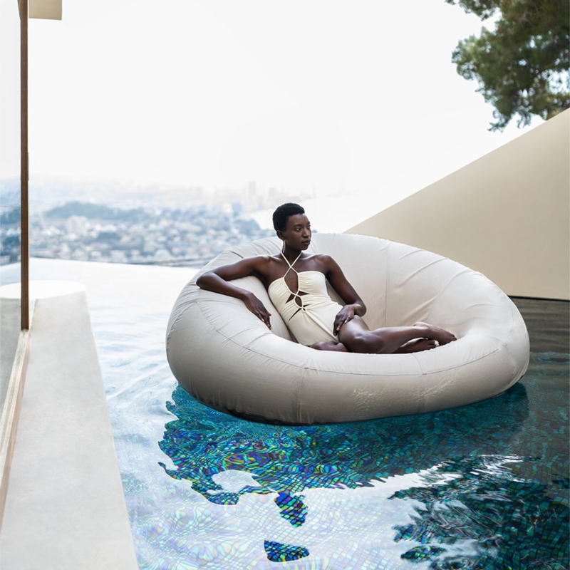Oversized Beige Pool Lounger Circular Design Segmented Panels Modern.