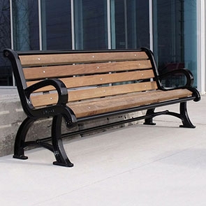 Park Bench: Vintage Style, Flared Legs, Curved Metal Armrests.