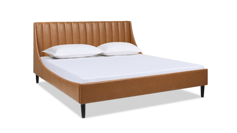 Platform Bed Caramel Faux Leather Wingback Silhouette