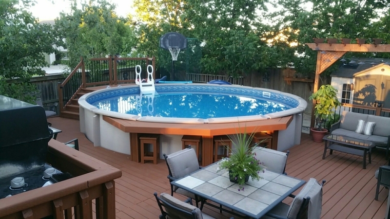 Pool Bar: Cedar Brown Tiered Decking with Wrap Around Counter.
