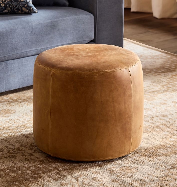 Round Ottoman with Vertical Seams, Matte Cognac Natural Grain Finish.