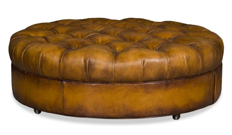 Round Tufted Ottoman with Aged Patina and Casters, Tobacco Brown.