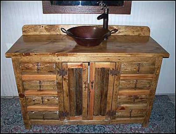 Rustic Log Bathroom Vanity featuring Copper Vessel Sink and Pump Faucet