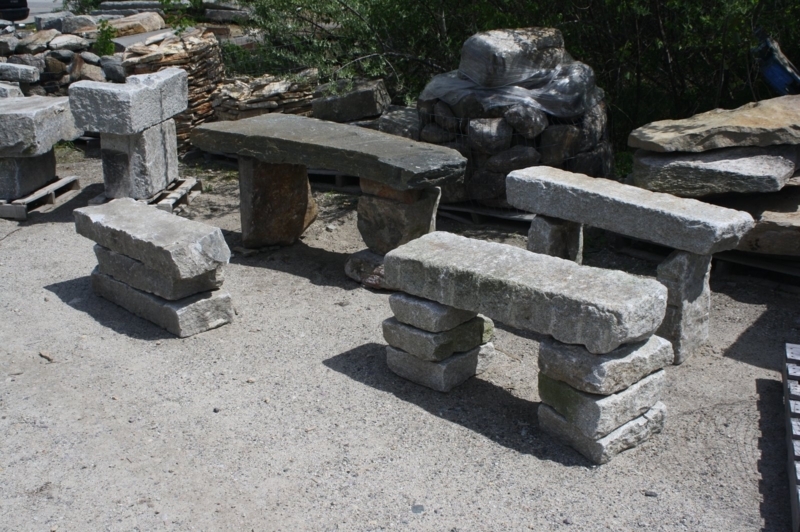 Rustic Outdoor Stone Seating: Stacked Stone Base, Organic Edges.