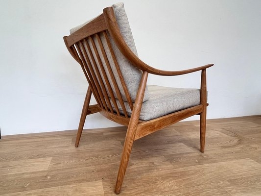 Scandinavian Lounge Chair featuring Spindled Back and Wood Frame