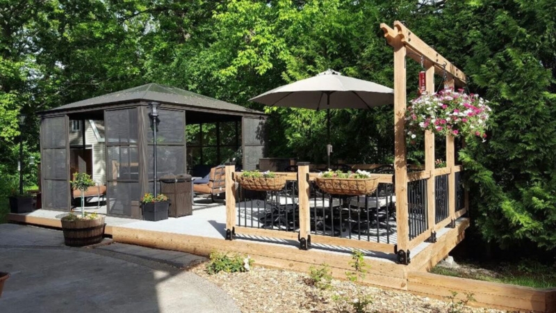 Screened Gazebo Deck Retreat with Integrated Planters