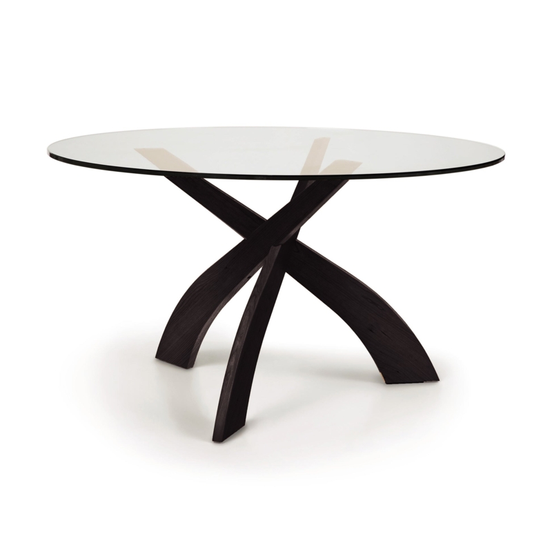 Sculptural Glass Dining Table with Dark Wood Interlocking Tripod Base