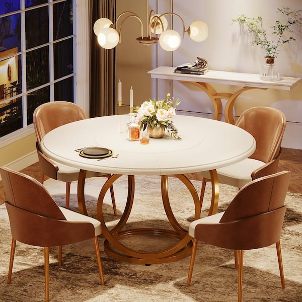 Sculptural Gold Circle Base Table with Cognac Upholstered Chairs