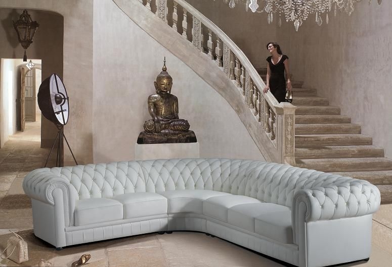 Sectional Sofa: Curved White Leather Seating with Rolled Arms