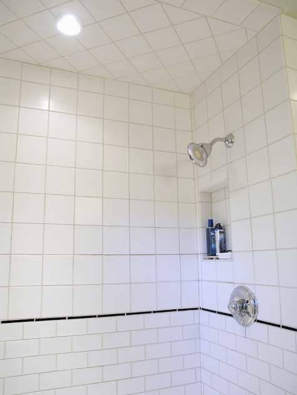 Shower Surround with Black Tile Liner and Diagonal Ceiling Grid