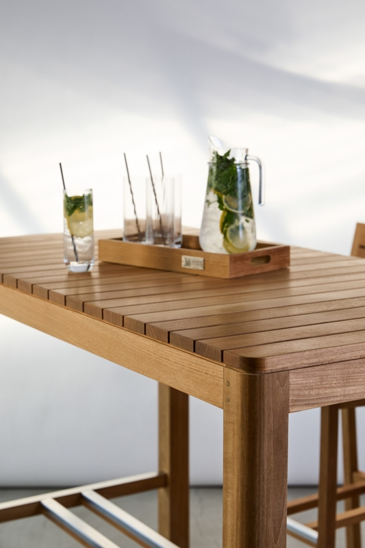 Slatted Teak Bar Table featuring a Metal Footrest Rail